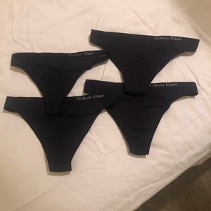 Calvin Klein black thongs